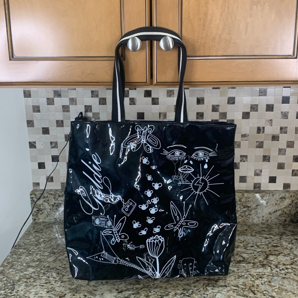 Goldie vinyl bag. Black with white markings.